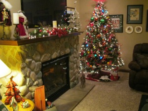 In the family room downstairs, I opted for the traditional red and green tree with many of the family ornaments collected over the years.  